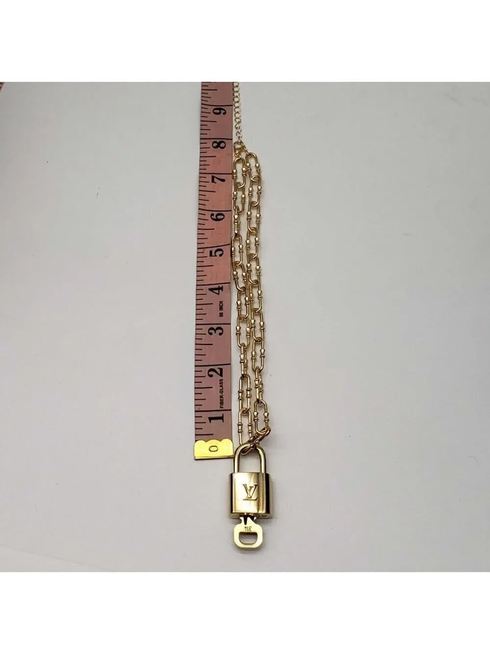 Authentic Louis Vuitton Lock and Key Gold Color with Gold Plated Chain Necklace